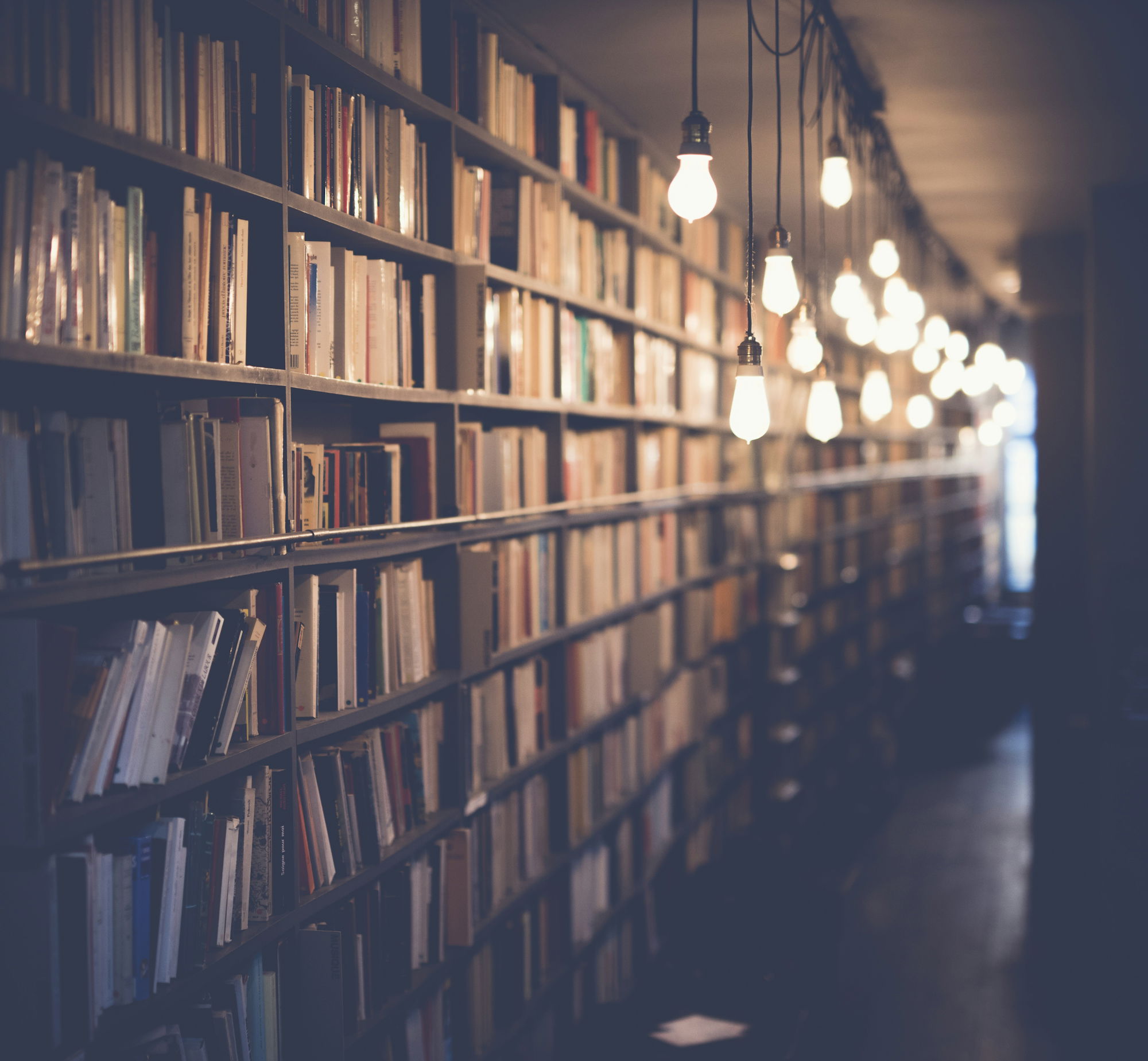 photo-of-library-with-turned-on-lights.jpg photo of library with turned on lights